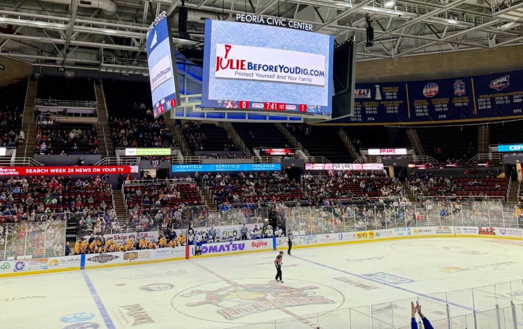The JULIE Logo on the large screen above the hockey rink